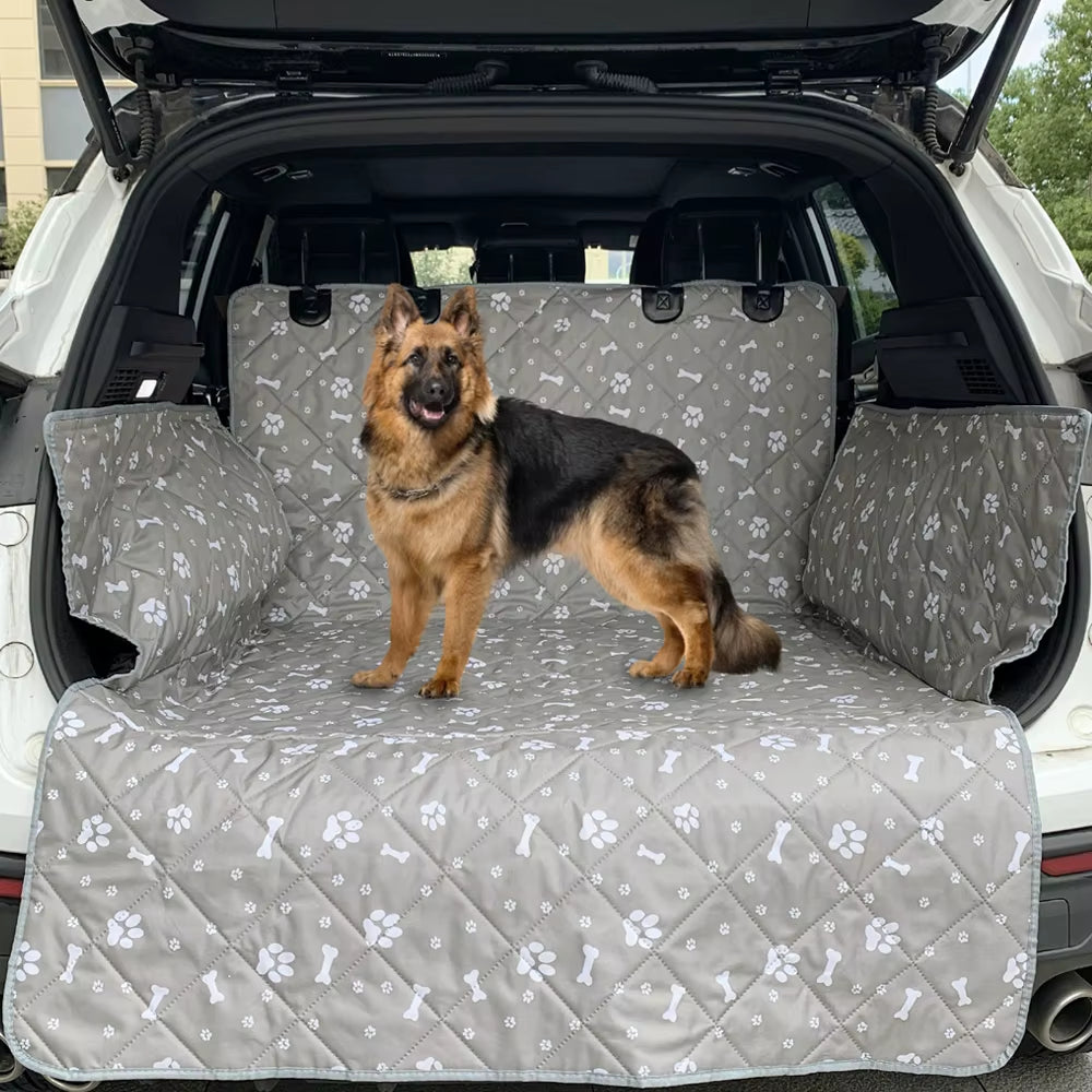 German Shepherd standing on the cargo liner in an SUV boot