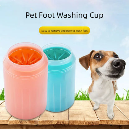 Pink and blue paw rinse cups beside a Jack Russell terrier