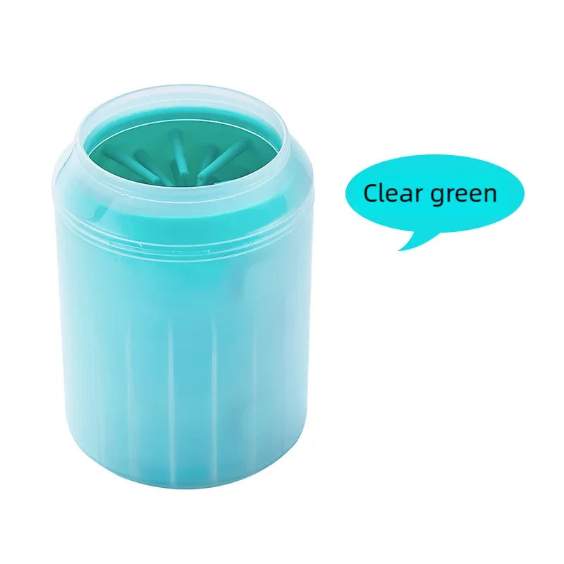 Clear green silicone paw rinse cup on a white background